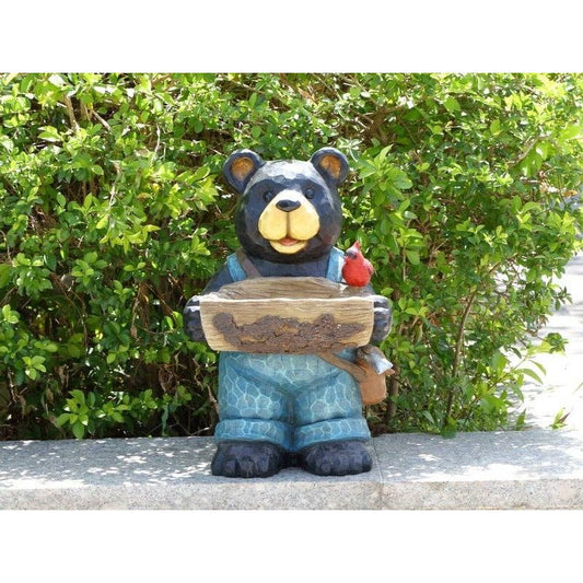 Bear Holds Bird Bath With Cardinal