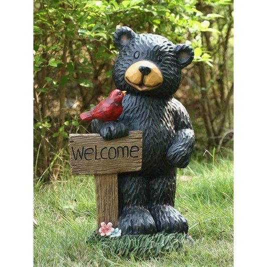 Bear Holding Welcome Sign